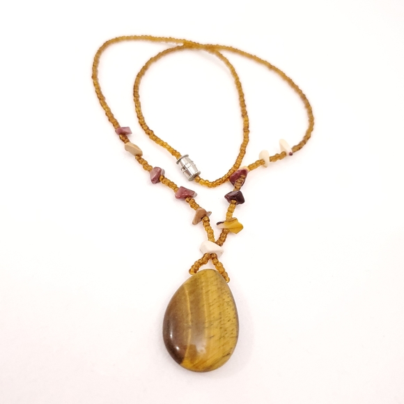 Stone Pendant on a tan Beaded Necklace - Picture 2 of 7